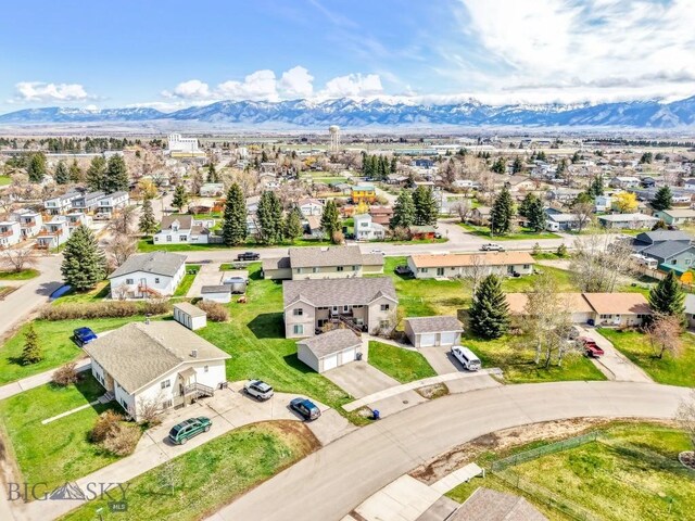 904 Jeanette Pl Unit 4, Belgrade, MT 59714 - birds eye view of property featuring a residential view and a mountain view