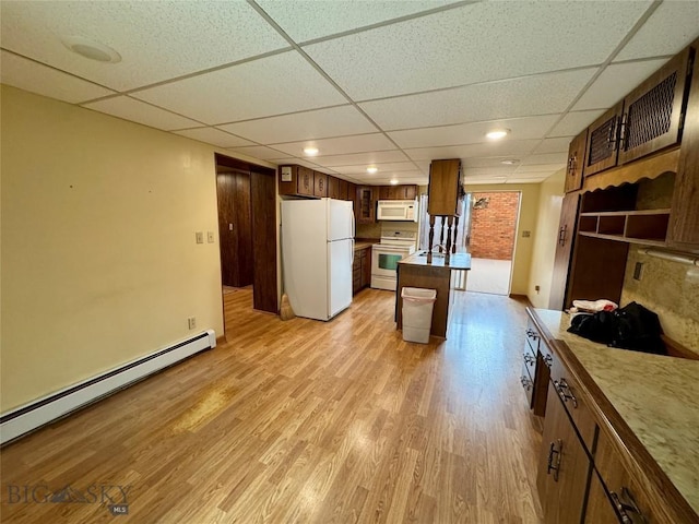 kitchen featuring recessed lighting, light wood-style flooring, white appliances, a drop ceiling, and a baseboard radiator