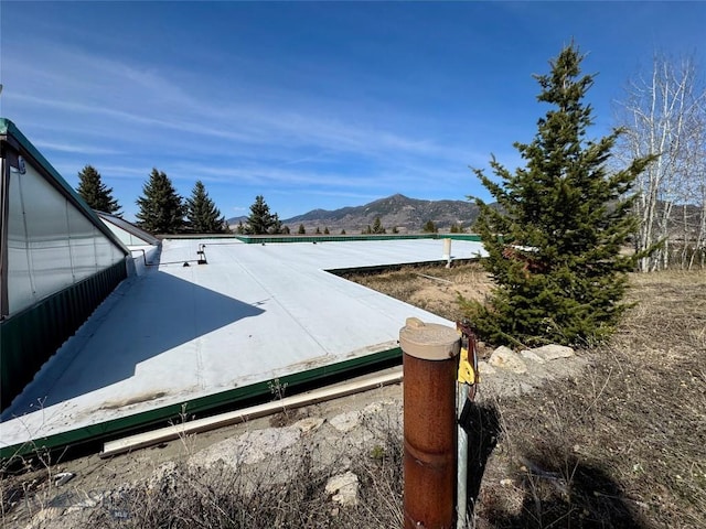 exterior space featuring a mountain view