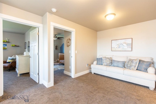 living room with carpet floors and baseboards