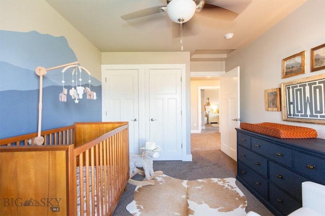 carpeted bedroom featuring ceiling fan, baseboards, and a closet