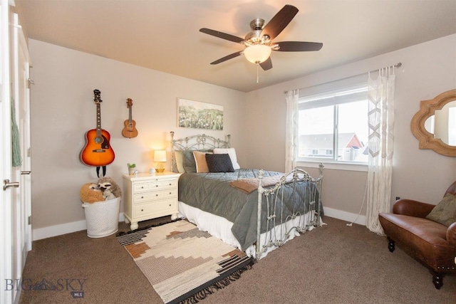 bedroom featuring baseboards, ceiling fan, and carpet flooring