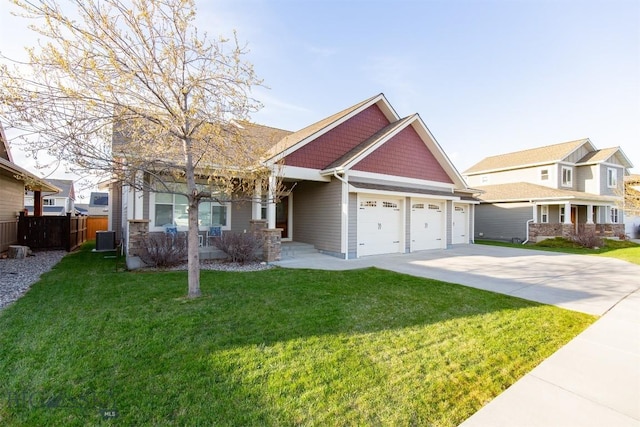 craftsman inspired home featuring driveway, a front lawn, a porch, and an attached garage