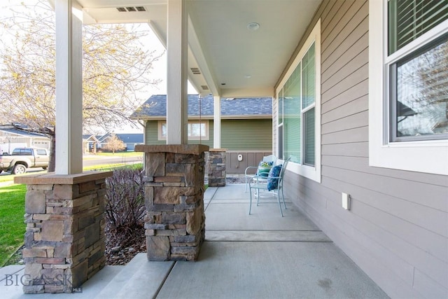 view of patio / terrace with visible vents and a porch