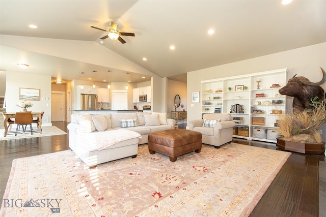 living area featuring recessed lighting, wood finished floors, a ceiling fan, and vaulted ceiling