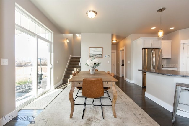 dining space with stairway, recessed lighting, dark wood-style floors, and baseboards