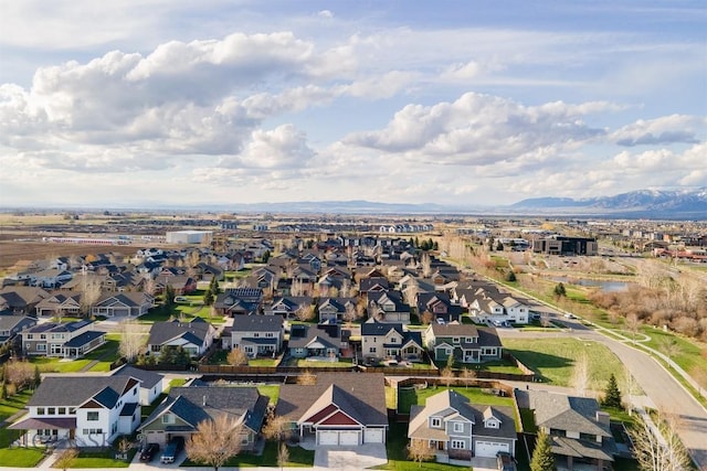 aerial view featuring a residential view and a mountain view
