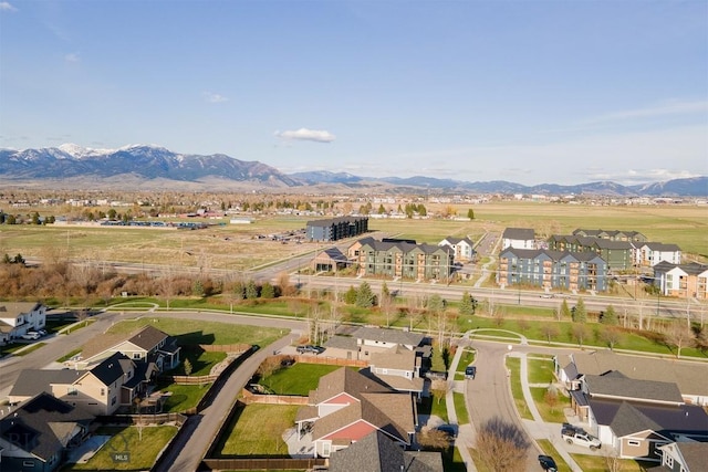 aerial view with a mountain view and a residential view