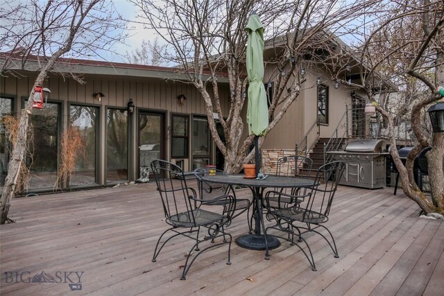 726 US Highway 10 W, Livingston, MT 59047 - wooden deck with area for grilling and outdoor dining area