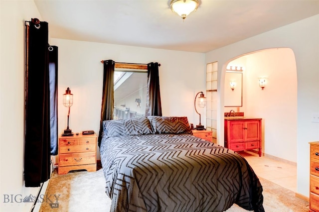 726 US Highway 10 W, Livingston, MT 59047 - bedroom with arched walkways and light colored carpet