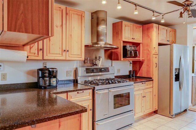 726 US Highway 10 W, Livingston, MT 59047 - kitchen featuring stainless steel refrigerator with ice dispenser, double oven range, island exhaust hood, light brown cabinetry, and light tile patterned floors