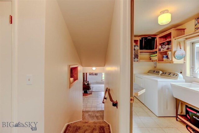 726 US Highway 10 W, Livingston, MT 59047 - laundry room with washer and clothes dryer and light tile patterned flooring