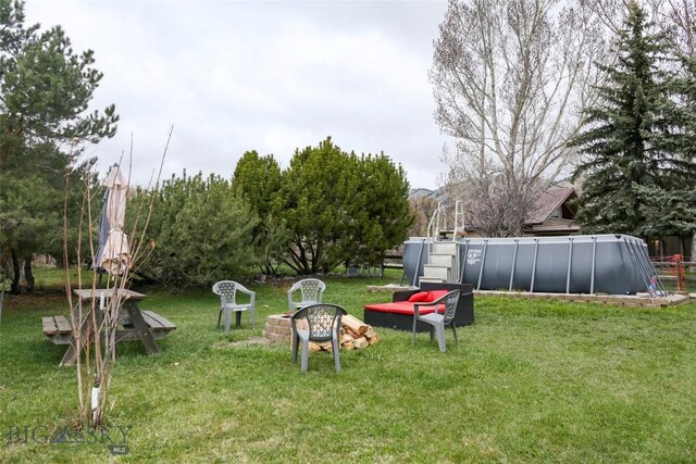 726 US Highway 10 W, Livingston, MT 59047 - view of green lawn featuring an outdoor pool
