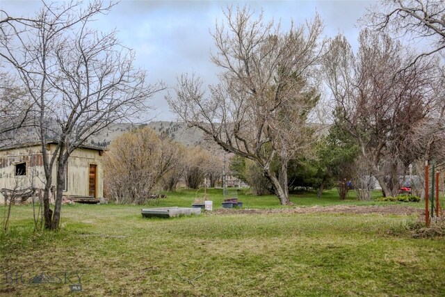 726 US Highway 10 W, Livingston, MT 59047 - view of grassy yard with an outdoor structure