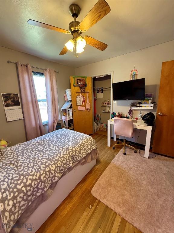 2900 Kennedy, Butte, MT 59701 - bedroom featuring wood finished floors, ceiling fan, and a closet