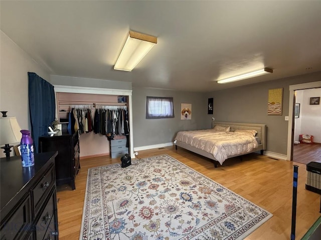 2900 Kennedy, Butte, MT 59701 - bedroom with baseboards, light wood-style flooring, and a closet