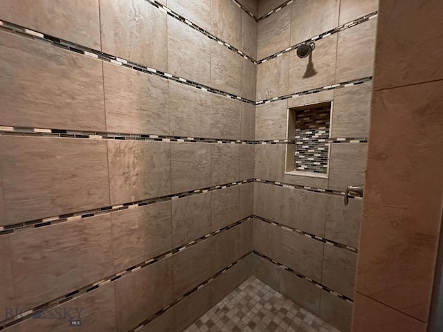 details featuring a tile shower