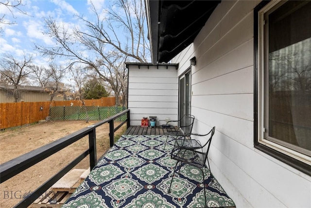 view of patio / terrace featuring fence