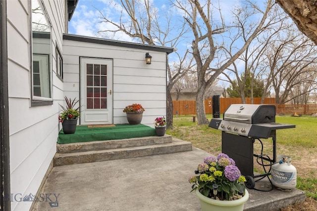 view of patio / terrace with fence and grilling area