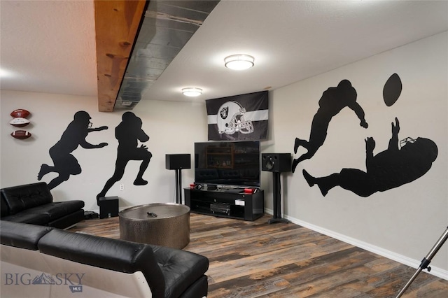 7550 Springhill Rd, Belgrade, MT 59714 - living room featuring baseboards and wood finished floors