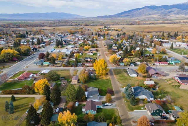 drone / aerial view with a residential view and a mountain view