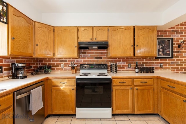 kitchen with light countertops, under cabinet range hood, dishwasher, and range with electric cooktop