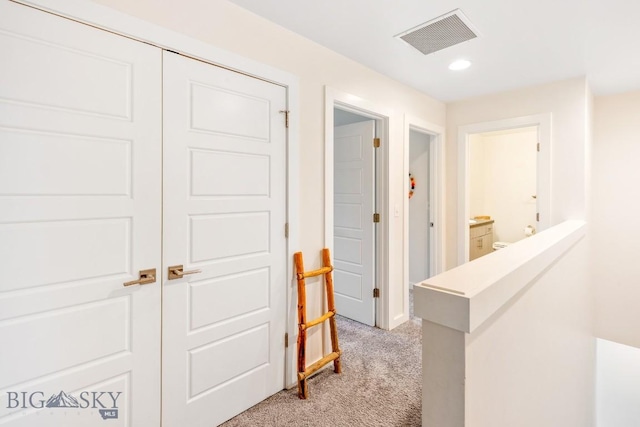 1307 Grover Ln Unit B, Belgrade, MT 59714 - hall with visible vents, recessed lighting, baseboards, and light carpet