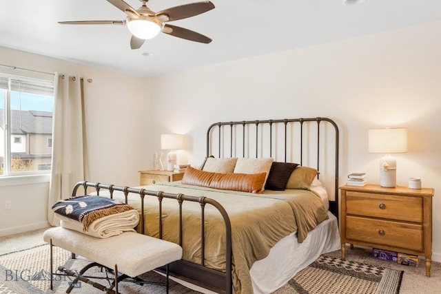 1307 Grover Ln Unit B, Belgrade, MT 59714 - carpeted bedroom with baseboards and ceiling fan