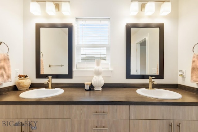 1307 Grover Ln Unit B, Belgrade, MT 59714 - bathroom featuring double vanity and a sink
