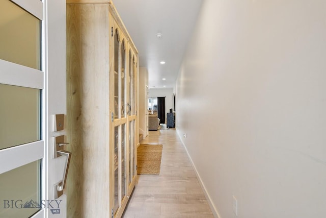 1307 Grover Ln Unit B, Belgrade, MT 59714 - corridor featuring baseboards, recessed lighting, and light wood-style floors