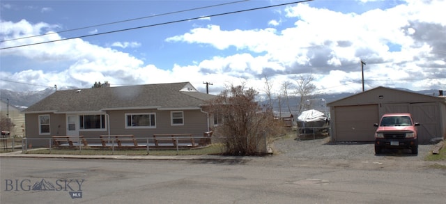 820 Lexington Ave, Butte, MT 59701 - view of front of property with fence, an outbuilding, and a garage