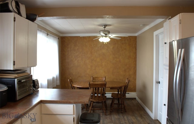820 Lexington Ave, Butte, MT 59701 - dining room with baseboards, ornamental molding, a ceiling fan, and wood finished floors
