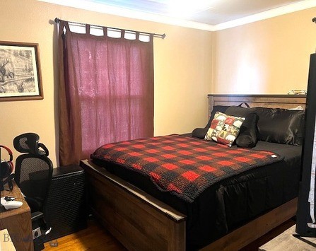 820 Lexington Ave, Butte, MT 59701 - bedroom featuring crown molding and wood finished floors