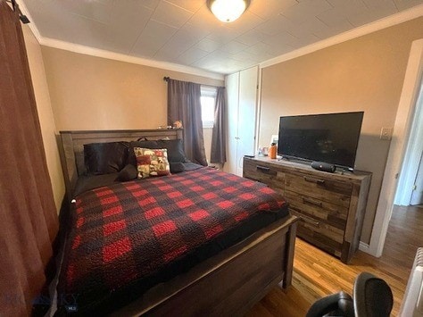 820 Lexington Ave, Butte, MT 59701 - bedroom with ornamental molding and wood finished floors