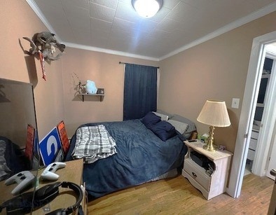 820 Lexington Ave, Butte, MT 59701 - bedroom with crown molding and wood finished floors