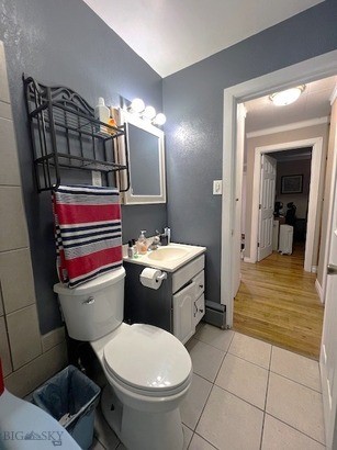 820 Lexington Ave, Butte, MT 59701 - bathroom with tile patterned floors, vanity, and toilet