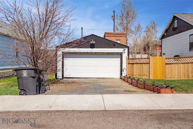 detached garage with fence