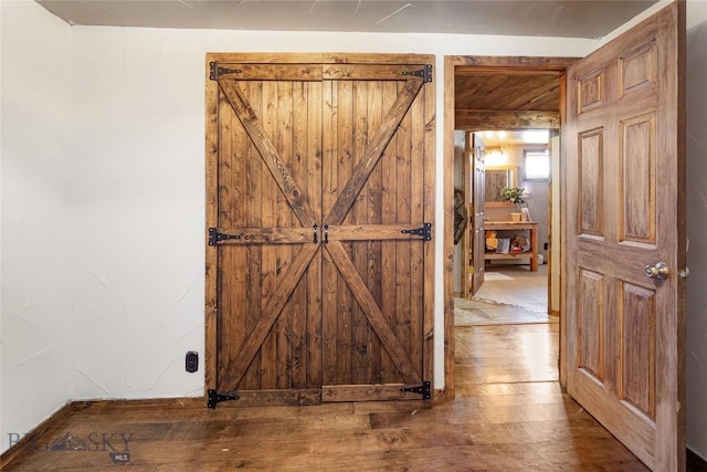 interior space with hardwood / wood-style flooring
