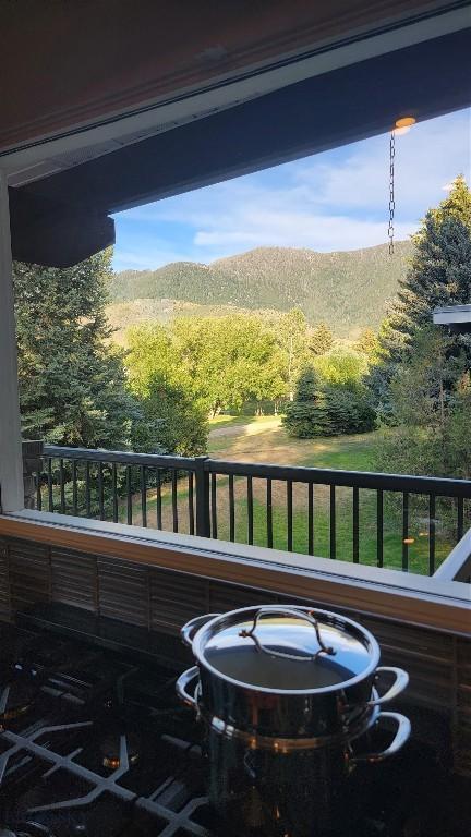 balcony featuring a mountain view