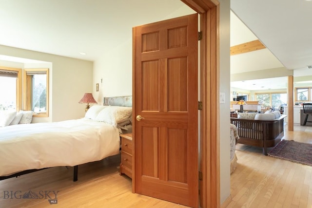 bedroom with recessed lighting and light wood finished floors