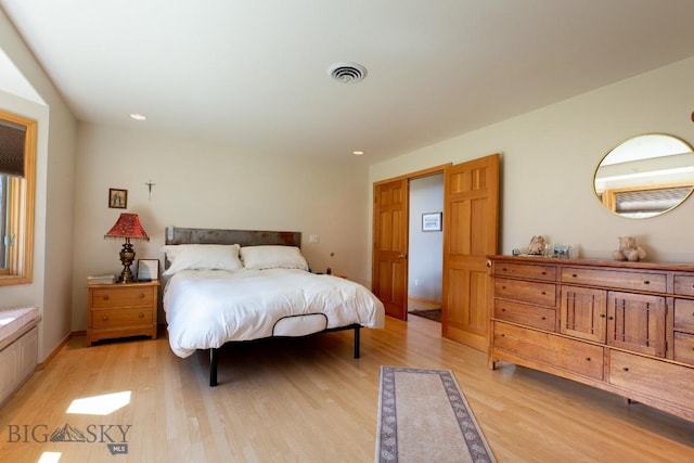 bedroom featuring recessed lighting, light wood-style flooring, and visible vents
