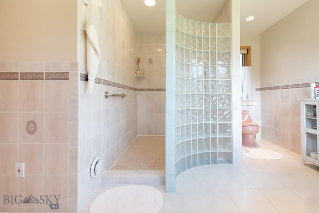 full bath with tile walls, tile patterned flooring, walk in shower, toilet, and recessed lighting