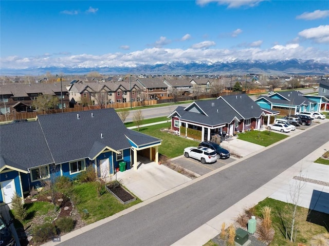 aerial view with a mountain view and a residential view