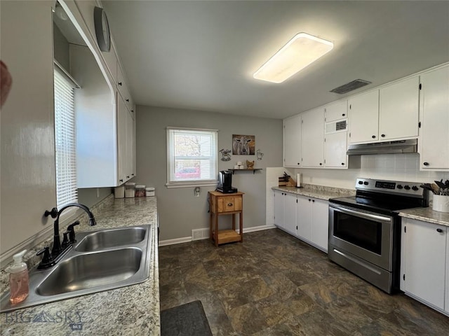 216 W 2nd Ave, Big Timber, MT 59011 - kitchen with visible vents, electric range, under cabinet range hood, white cabinets, and a sink