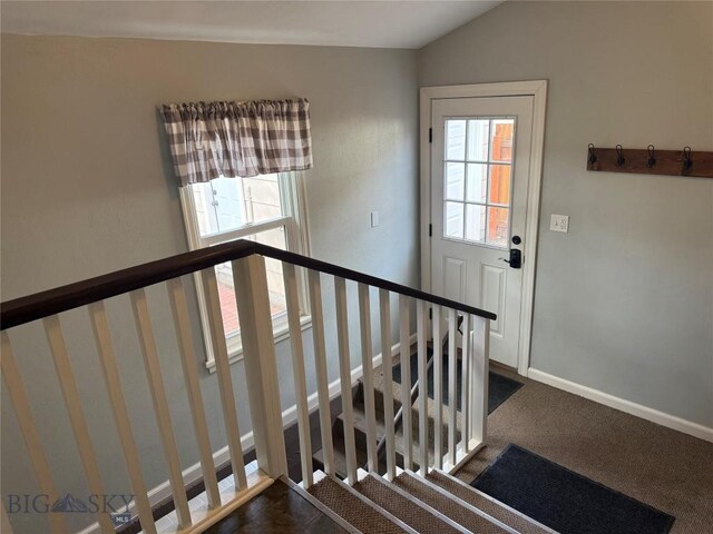 216 W 2nd Ave, Big Timber, MT 59011 - stairs featuring carpet floors, baseboards, and vaulted ceiling