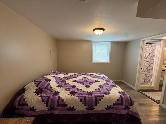 216 W 2nd Ave, Big Timber, MT 59011 - bedroom featuring baseboards and wood finished floors