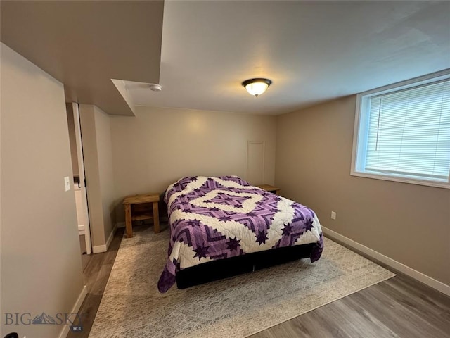 216 W 2nd Ave, Big Timber, MT 59011 - bedroom with baseboards and wood finished floors