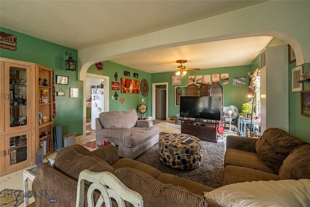 124 S M St, Livingston, MT 59047 - living area featuring arched walkways and ceiling fan