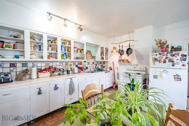 124 S M St, Livingston, MT 59047 - kitchen with white appliances, backsplash, open shelves, and white cabinetry
