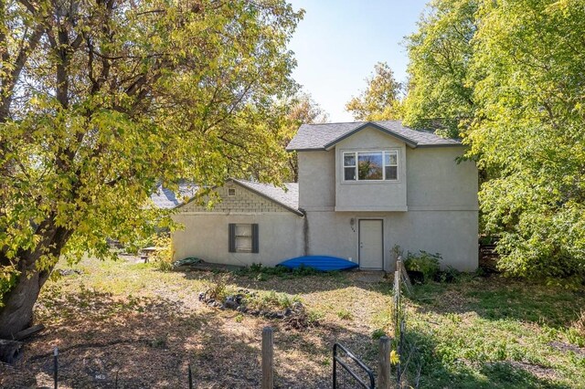 124 S M St, Livingston, MT 59047 - back of property with stucco siding